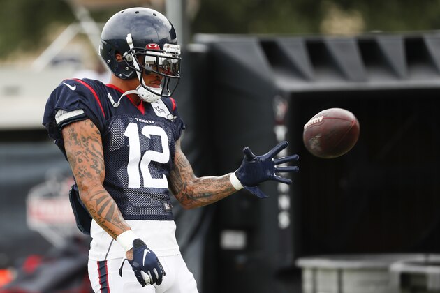 Houston Texans wide receiver Kenny Stills reaches out to catch a football during an NFL training camp football practice Monday, Aug. 17, 2020, in Houston. (Brett Coomer/Pool Photo via AP)