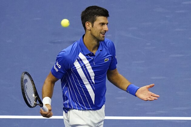 Novak Djokovic, of Serbia, reacts to missing a point to Jan-Lennard Struff, of Germany, during the third round of the U.S. Open tennis championships, Friday, Sept. 4, 2020, in New York. (AP Photo/Frank Franklin II)