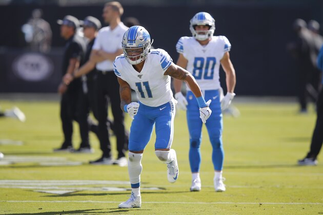 Detroit Lions wide receiver Marvin Jones Jr. (11) and wide receiver Danny Amendola (80) warm up before an NFL football game against the Oakland Raiders in Oakland, Calif., Sunday, Nov. 3, 2019. (AP Photo/John Hefti)