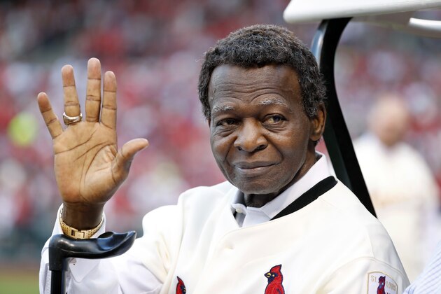 FILE - This May 17, 2017 file photo shows Lou Brock, a member of the St. Louis Cardinals' 1967 World Series championship team, taking part in a ceremony honoring the 50th anniversary of the victory before the start of a baseball game between the St. Louis Cardinals and the Boston Red Sox in St. Louis. Brock says he is free of cancer more than three months after the 78-year-old St. Louis Cardinals great announced he had been diagnosed with a type of blood cancer. Brock said in a statement Friday, July 28, 2017 that a doctor's diagnosis that he had conquered multiple myeloma was
