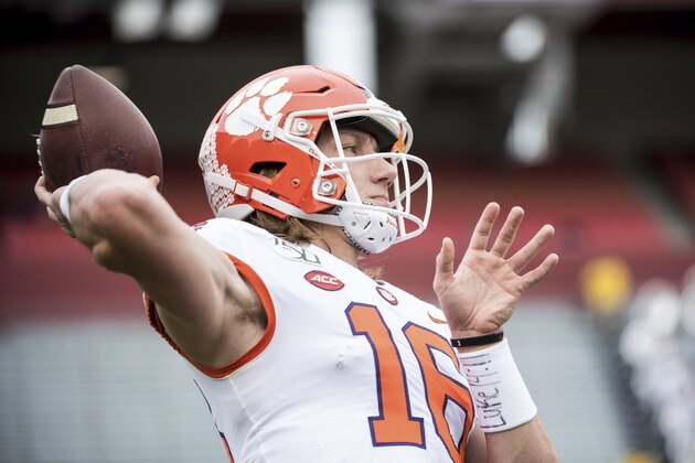 Clemson quarterback Trevor Lawrence (16) warms up before an NCAA college football game against South Carolina Saturday, Nov. 30, 2019, in Columbia, S.C. Clemson defeated South Carolina 38-3. (AP Photo/Sean Rayford)