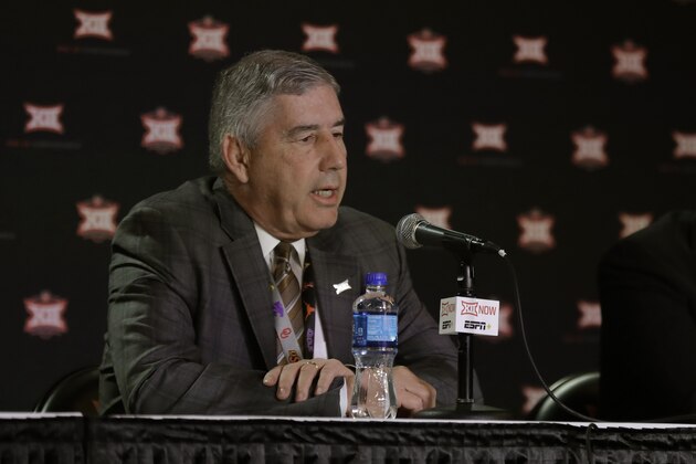 Big 12 commissioner Bob Bowlsby talks to the media after canceling the remaining NCAA college basketball games in the Big 12 Conference tournament due to concerns about the coronavirus Thursday, March 12, 2020, in Kansas City, Mo. The biggest conferences in college sports all canceled their basketball tournaments because of the new coronavirus, seemingly putting the NCAA Tournament in doubt. (AP Photo/Charlie Riedel)