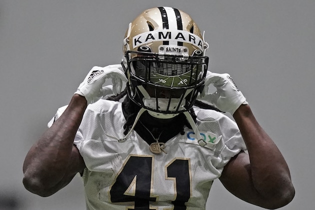 The field is reflected in the visor of New Orleans Saints running back Alvin Kamara (41) during practice at their NFL football training facility in Metairie, La., Wednesday, Sept. 2, 2020. (AP Photo/Gerald Herbert, Pool)