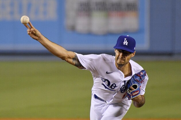 Los Angeles Dodgers relief pitcher Joe Kelly throws to the plate during the eighth inning of a baseball game against the San Francisco Giants Friday, Aug. 7, 2020, in Los Angeles. (AP Photo/Mark J. Terrill)
