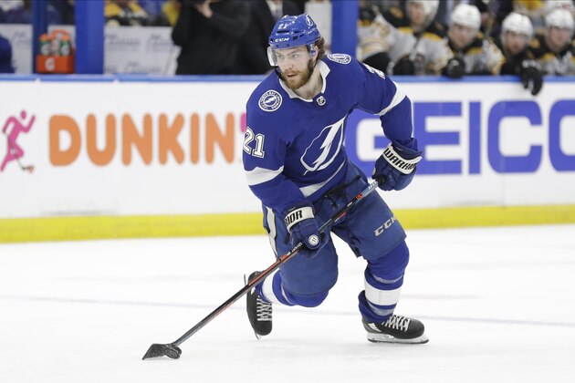 Tampa Bay Lightning center Brayden Point (21) against the Boston Bruins during the second period of an NHL hockey game Tuesday, March 3, 2020, in Tampa, Fla. (AP Photo/Chris O'Meara)
