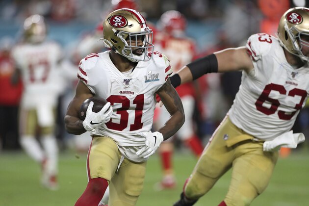 San Francisco 49ers running back Raheem Mostert (31) rushes against the Kansas City Chiefs at Super Bowl 54 on Feb. 2, 2020, in Miami Gardens, Fla. The Chiefs won the game 31-20. (AP Photo/Gregory Payan)
