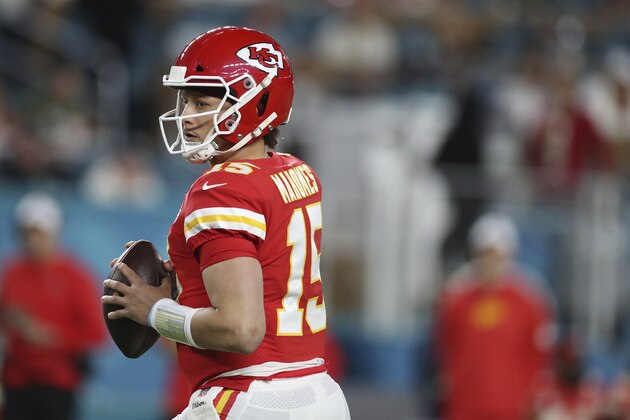Kansas City Chiefs quarterback Patrick Mahomes (15) looks to make a pass during the first half of the NFL Super Bowl 54 football game between the San Francisco 49ers and Kansas City Chiefs Sunday, Feb. 2, 2020, in Miami Gardens, Fla. The Kansas City Chiefs won 31-20. (AP Photo/Steve Luciano)