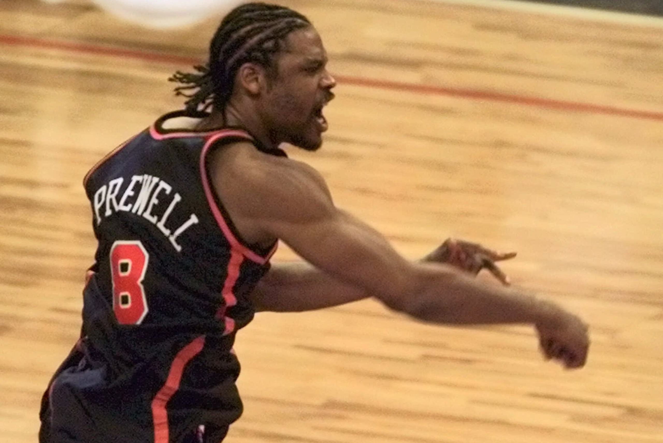 New York Knicks guard Latrell Sprewell runs down court as he celebrates the game-winning basket by Allan Houston, during the fourth quarter of game five against the Miami Heat in the first round of the Eastern Conference playoffs in Miami Sunday, May, 16, 1999. The Knicks beat the Heat 78-77.(AP Photo/Wilfredo Lee)