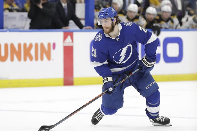 Tampa Bay Lightning center Brayden Point (21) against the Boston Bruins during the second period of an NHL hockey game Tuesday, March 3, 2020, in Tampa, Fla. (AP Photo/Chris O'Meara)