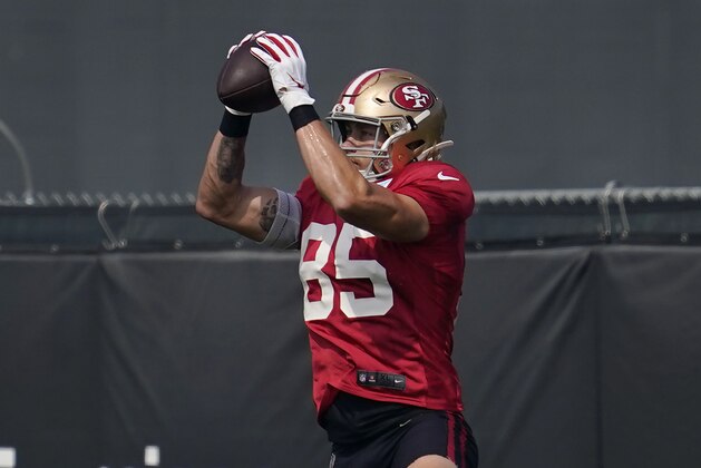 San Francisco 49ers' George Kittle catches a pass during NFL football practice in Santa Clara, Calif., Saturday, Aug. 22, 2020. (AP Photo/Jeff Chiu, Pool)