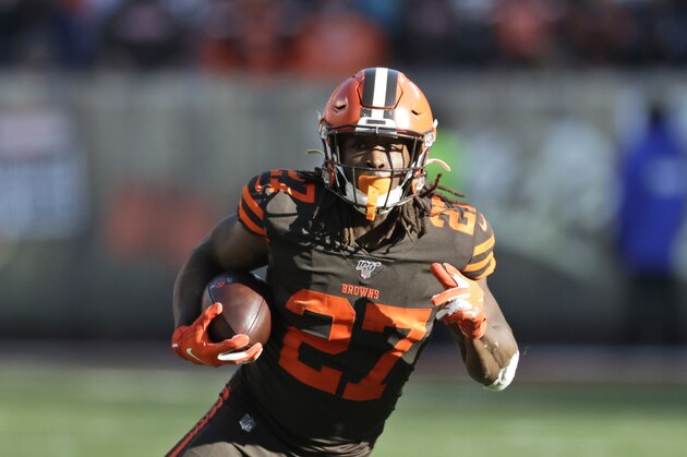 Cleveland Browns running back Kareem Hunt rushes against the Baltimore Ravens during the first half of an NFL football game, Sunday, Dec. 22, 2019, in Cleveland. (AP Photo/Ron Schwane)