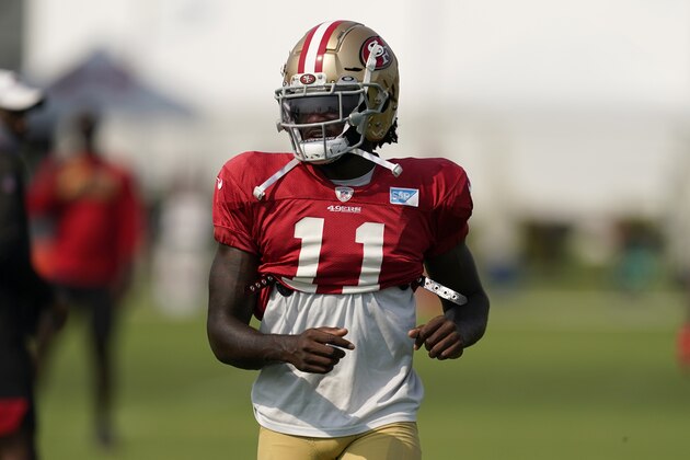 San Francisco 49ers' Brandon Aiyuk walks on the field during NFL football practice in Santa Clara, Calif., Tuesday, Aug. 18, 2020. (AP Photo/Jeff Chiu, Pool)