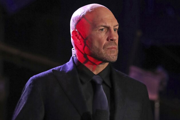 Randy Couture is seen broadcasting during a mixed martial arts bout at PFL 1, Thursday, June 7, 2018, at Madison Square Garden in New York. (AP Photo/Gregory Payan)