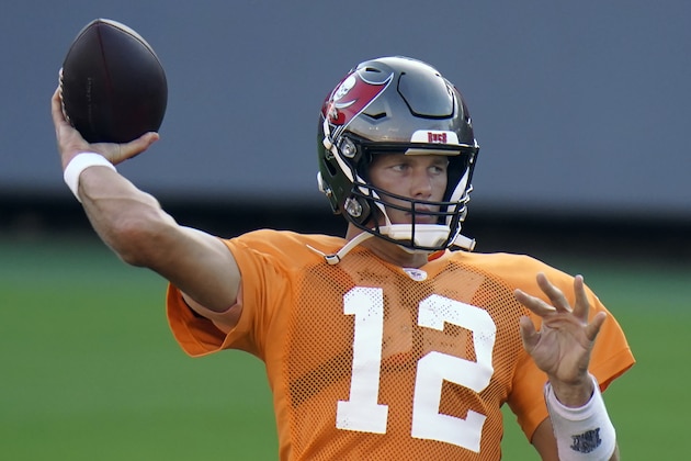 Tampa Bay Buccaneers quarterback Tom Brady (12) throws a pass during an NFL football training camp practice Friday, Aug. 28, 2020, in Tampa, Fla. (AP Photo/Chris O'Meara)