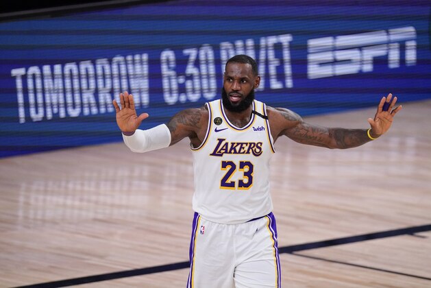 Los Angeles Lakers' LeBron James (23) reacts during the second half of an NBA conference semifinal playoff basketball game against the Houston Rockets Tuesday, Sept. 8, 2020, in Lake Buena Vista, Fla. The Lakers won 112-102. (AP Photo/Mark J. Terrill)