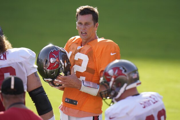 Tampa Bay Buccaneers quarterback Tom Brady (12) during an NFL football training camp practice Friday, Aug. 28, 2020, in Tampa, Fla. (AP Photo/Chris O'Meara)