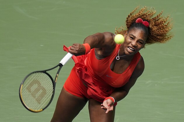 Serena Williams, of the United States, serves to Tsvetana Pironkova, of Bulgaria, during the quarterfinals of the US Open tennis championships, Wednesday, Sept. 9, 2020, in New York. (AP Photo/Seth Wenig)