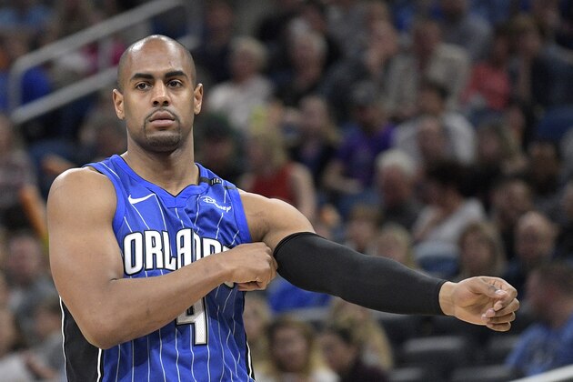 Orlando Magic guard Arron Afflalo (4) adjusts his arm sleeve after entering the game during the first half of an NBA basketball game against the Utah Jazz Saturday, Nov. 18, 2017, in Orlando, Fla. (AP Photo/Phelan M. Ebenhack)