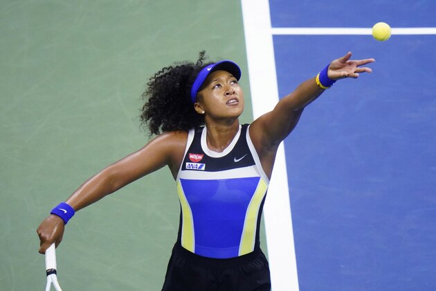 Naomi Osaka, of Japan, serves to Shelby Rogers, of the United States, during the quarterfinal round of the US Open tennis championships, Tuesday, Sept. 8, 2020, in New York. (AP Photo/Frank Franklin II)