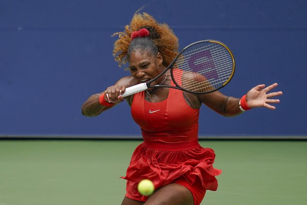 Serena Williams, of the United States, returns a shot to Tsvetana Pironkova, of Bulgaria, during the quarterfinals of the US Open tennis championships, Wednesday, Sept. 9, 2020, in New York. (AP Photo/Seth Wenig)