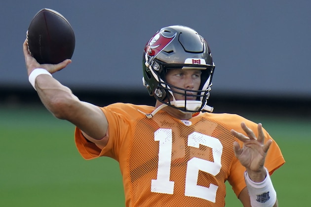 Tampa Bay Buccaneers quarterback Tom Brady (12) throws a pass during an NFL football training camp practice Friday, Aug. 28, 2020, in Tampa, Fla. (AP Photo/Chris O'Meara)