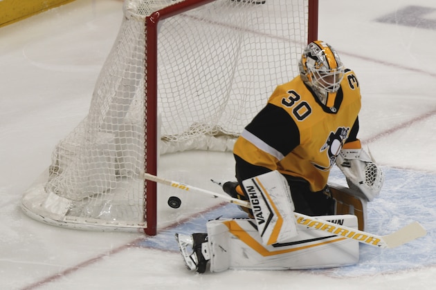 A shot by Washington Capitals' Nic Dowd gets past Pittsburgh Penguins goaltender Matt Murray for a goal during the first period of an NHL hockey game, Saturday, March 7, 2020, in Pittsburgh. (AP Photo/Keith Srakocic)