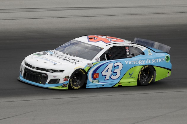 Bubba Wallace (43) drives during a NASCAR Cup Series auto race Sunday, July 12, 2020, in Sparta, Ky. (AP Photo/Mark Humphrey)