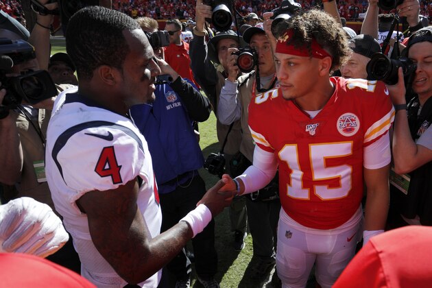 Kansas City Chiefs quarterback Patrick Mahomes (15) and Houston Texans quarterback Deshaun Watson (4) shake hands following an NFL football game in Kansas City, Mo., Sunday, Oct. 13, 2019. The Houston Texans won 31-24. (AP Photo/Colin E. Braley)