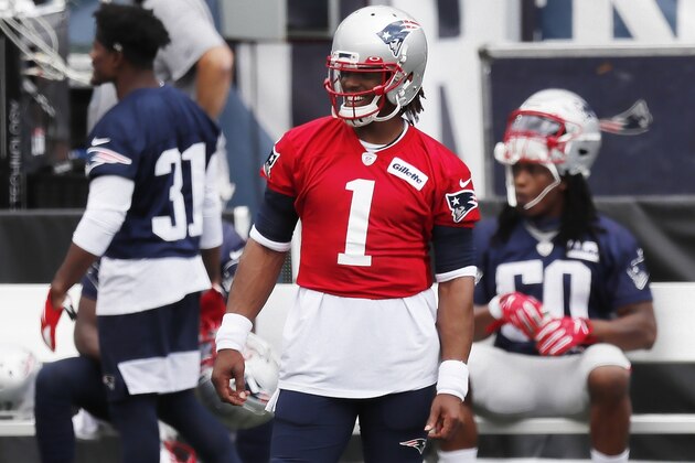 New England Patriots quarterback Cam Newton (1) stands on the sidelines before an NFL football training camp scrimmage, Friday, Aug. 28, 2020, in Foxborough, Mass. (AP Photo/Michael Dwyer, Pool)