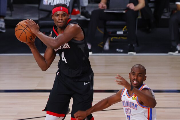 Houston Rockets' Danuel House Jr. (4) passes against Oklahoma City Thunder's Chris Paul (3) during the first quarter of Game 4 of an NBA basketball first-round playoff series, Monday, Aug. 24, 2020, in Lake Buena Vista, Fla. (Kevin C. Cox/Pool Photo via AP)