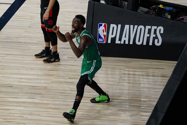 Boston Celtics guard Kemba Walker (8) questions an offensive foul against the Toronto Raptors during the second half of an NBA conference semifinal playoff basketball game Wednesday, Sept. 9, 2020, in Lake Buena Vista, Fla. (AP Photo/Mark J. Terrill)