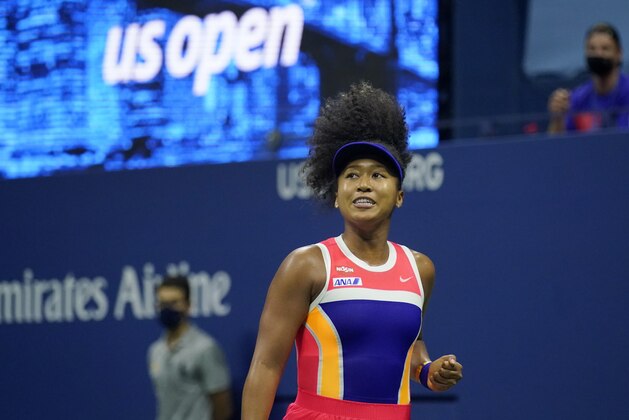 Naomi Osaka, of Japan, reacts during a semifinal match of the US Open tennis championships against Jennifer Brady, of the United States, Thursday, Sept. 10, 2020, in New York. (AP Photo/Seth Wenig)
