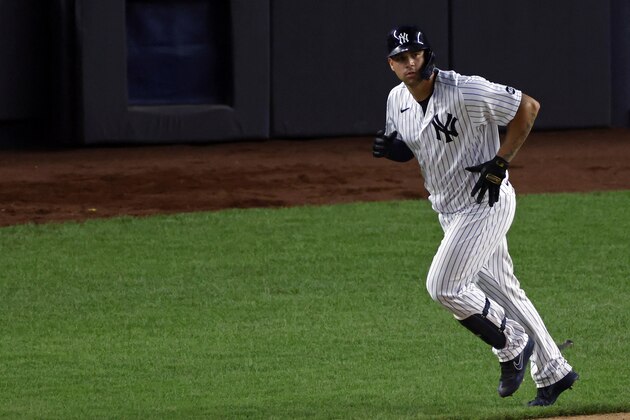 New York Yankees' Gary Sanchez runs up the first base line after hitting a grand slam against the New York Mets during the eighth inning of the second baseball game of a doubleheader, Sunday, Aug. 30, 2020, in New York. (AP Photo/Adam Hunger)