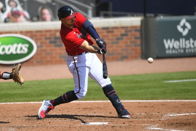 Atlanta Braves' Adam Duvall hits a line drive to left field for a ground rule double during the fourth inning of a baseball game against the Washington Nationals, Sunday, Sept. 6, 2020, in Atlanta. (AP Photo/John Amis)