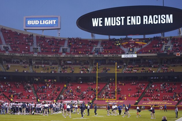 Kansas City Chiefs and Houston Texans players meet on the field during a moment of unity before an NFL football game Thursday, Sept. 10, 2020, in Kansas City, Mo. (AP Photo/Jeff Roberson)
