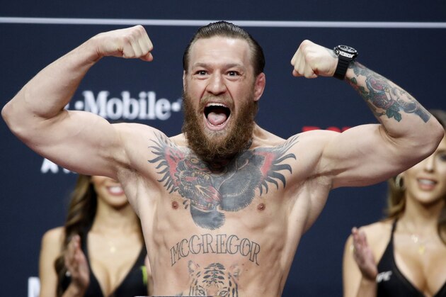 Conor McGregor poses during a ceremonial weigh-in for the UFC 246 mixed martial arts bout, Friday, Jan. 17, 2020, in Las Vegas. McGregor is scheduled to fight Donald