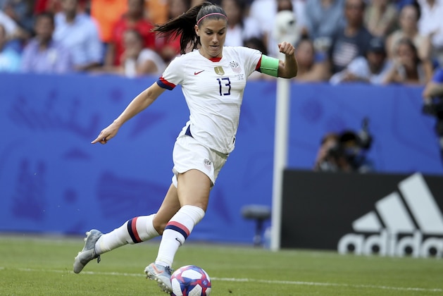 FILE - In this July 7, 2019, file photo, United States' Alex Morgan controls the ball during the Women's World Cup final soccer match against The Netherlands at the Stade de Lyon in Decines, outside Lyon, France. The U.S. national soccer team star and husband Servando Carrasco, who is a midfielder for the LA Galaxy, are expecting their first child, according to an announcement Wednesday, Oct. 23, 2019, on social media. (AP Photo/David Vincent, File)