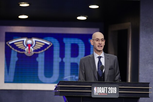 NBA Commissioner Adam Silver announces the New Orleans Pelicans' selection of Duke's Zion Williamson with the first pick in the NBA basketball draft Thursday, June 20, 2019, in New York. (AP Photo/Julio Cortez)