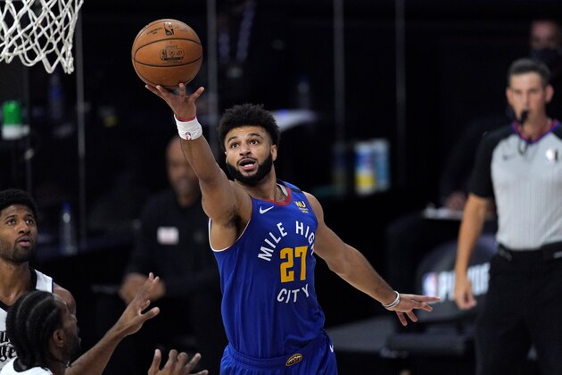 Denver Nuggets' Jamal Murray goes up for a shot during the first half of an NBA conference semifinal playoff basketball game against the Los Angeles Clippers, Friday, Sept. 11, 2020, in Lake Buena Vista, Fla. (AP Photo/Mark J. Terrill)