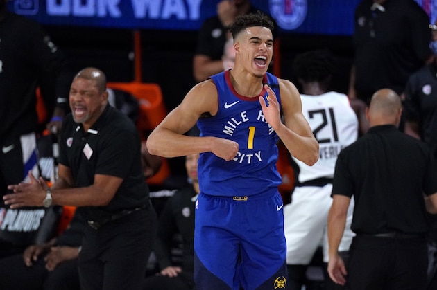 Denver Nuggets' Michael Porter Jr. reacts after a basket during the second half of an NBA conference semifinal playoff basketball game against the Los Angeles Clippers, Friday, Sept. 11, 2020, in Lake Buena Vista, Fla. (AP Photo/Mark J. Terrill)