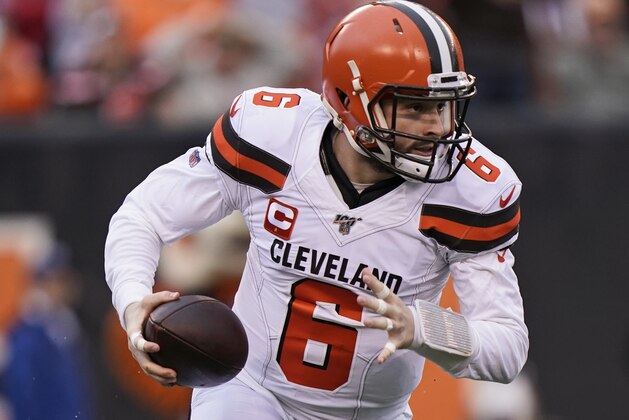 Cleveland Browns quarterback Baker Mayfield scrambles during the first half of an NFL football game against the Cincinnati Bengals, Sunday, Dec. 29, 2019, in Cincinnati. (AP Photo/Bryan Woolston)