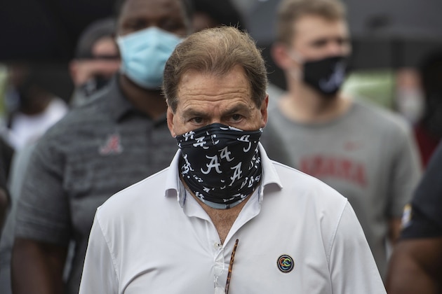 Alabama head football coach Nick Saban leads his team as they march on campus, supporting the Black Lives Matter movement, Monday, Aug. 31, 2020, in Tuscaloosa, Ala. (AP Photo/Vasha Hunt)