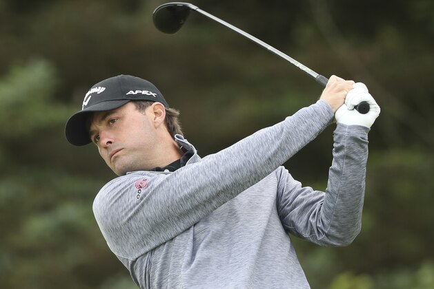 Kevin Kisner of the United States hits his shot from the 5th tee during the first round of the British Open Golf Championships at Royal Portrush in Northern Ireland, Thursday, July 18, 2019.(AP Photo/Jon Super)