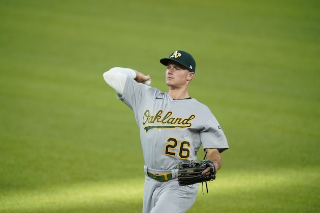 Oakland Athletics' Matt Chapman warms up before a baseball game against the Texas Rangers in Arlington, Texas, Tuesday, Aug. 25, 2020. (AP Photo/Tony Gutierrez)