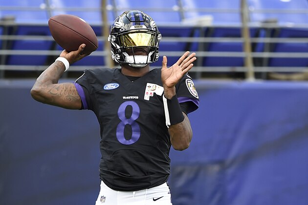 Baltimore Ravens quarterback Lamar Jackson throws a pass during NFL football training camp Saturday, Aug. 29, 2020, in Baltimore. (AP Photo/Gail Burton)