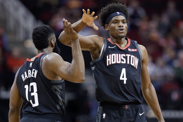 Houston Rockets forward Danuel House Jr. (4) celebrates a three point basket with guard James Harden during the first half of an NBA basketball game against the Denver Nuggets, Tuesday, Dec. 31, 2019, in Houston. (AP Photo/Eric Christian Smith) Houston Rockets forward Danuel House Jr. (4) celebrates a three point basket with guard James Harden during the first half of an NBA basketball game against the Denver Nuggets, Tuesday, Dec. 31, 2019, in Houston. (AP Photo/Eric Christian Smith)