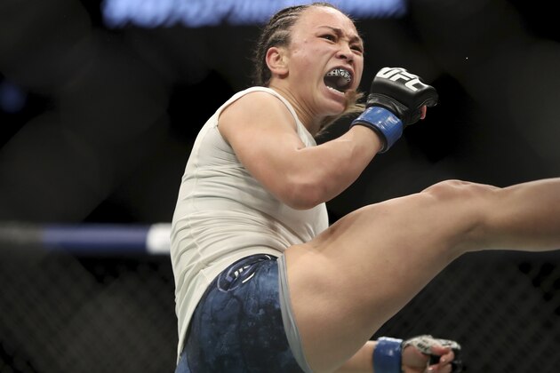 Karolina Kowalkiewicz in action against Michelle Waterson during their mixed martial arts bout at UFC Fight Night, Saturday, March 30, 2019, in Philadelphia. (AP Photo/Gregory Payan)