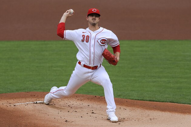 Cincinnati Reds' Tyler Mahle throws in the first inning during a baseball game against the St. Louis Cardinals in Cincinnati, Wednesday, Sep. 2, 2020. (AP Photo/Aaron Doster) Cincinnati Reds' Tyler Mahle throws in the first inning during a baseball game against the St. Louis Cardinals in Cincinnati, Wednesday, Sep. 2, 2020. (AP Photo/Aaron Doster)