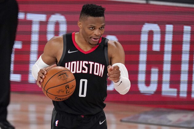 Houston Rockets' Russell Westbrook (0) gestures to teammates during the second half of an NBA first-round playoff basketball game against the Oklahoma City Thunder in Lake Buena Vista, Fla., Wednesday, Sept. 2, 2020. (AP Photo/Mark J. Terrill)