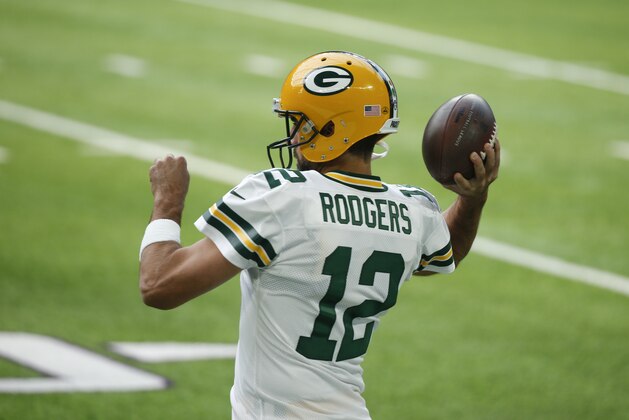 Green Bay Packers quarterback Aaron Rodgers warms up before an NFL football game against the Minnesota Vikings, Sunday, Sept. 13, 2020, in Minneapolis. (AP Photo/Bruce Kluckhohn)